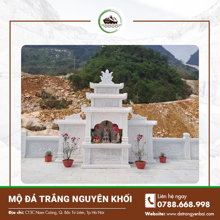 Mộ đá trắng nguyên khối chạm khắc hoa văn tinh tế với đường nét sắc sảo.