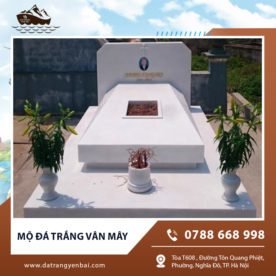 Mộ đá trắng vân mây kết hợp tiểu cảnh cây xanh thanh tịnh.